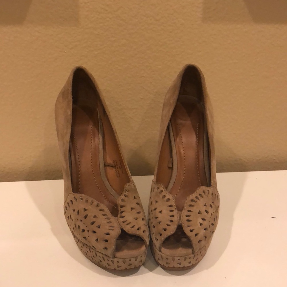 Tan suede heels with eyelet detail